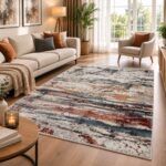 Moderner Teppich in Creme Grau Rost mit abstraktem Muster im Wohnzimmer