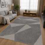 Moderner Teppich in Grau mit geometrischem Muster im Wohnzimmer