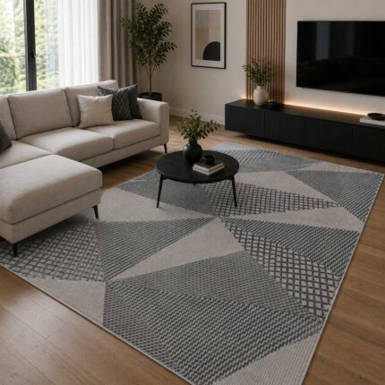 Moderner grauer Teppich mit abstraktem geometrischem Design im modernen Wohnzimmer